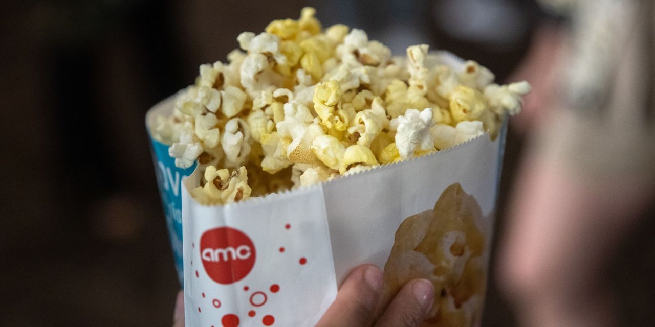 AMC Entertainment is planning a dividend on the "APE" preferred stock.  Stocks slide after earnings.