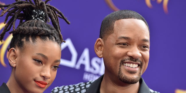 Willow Smith defended her father in an interview about the criticism he's faced since slapping Chris Rock at the Oscars.