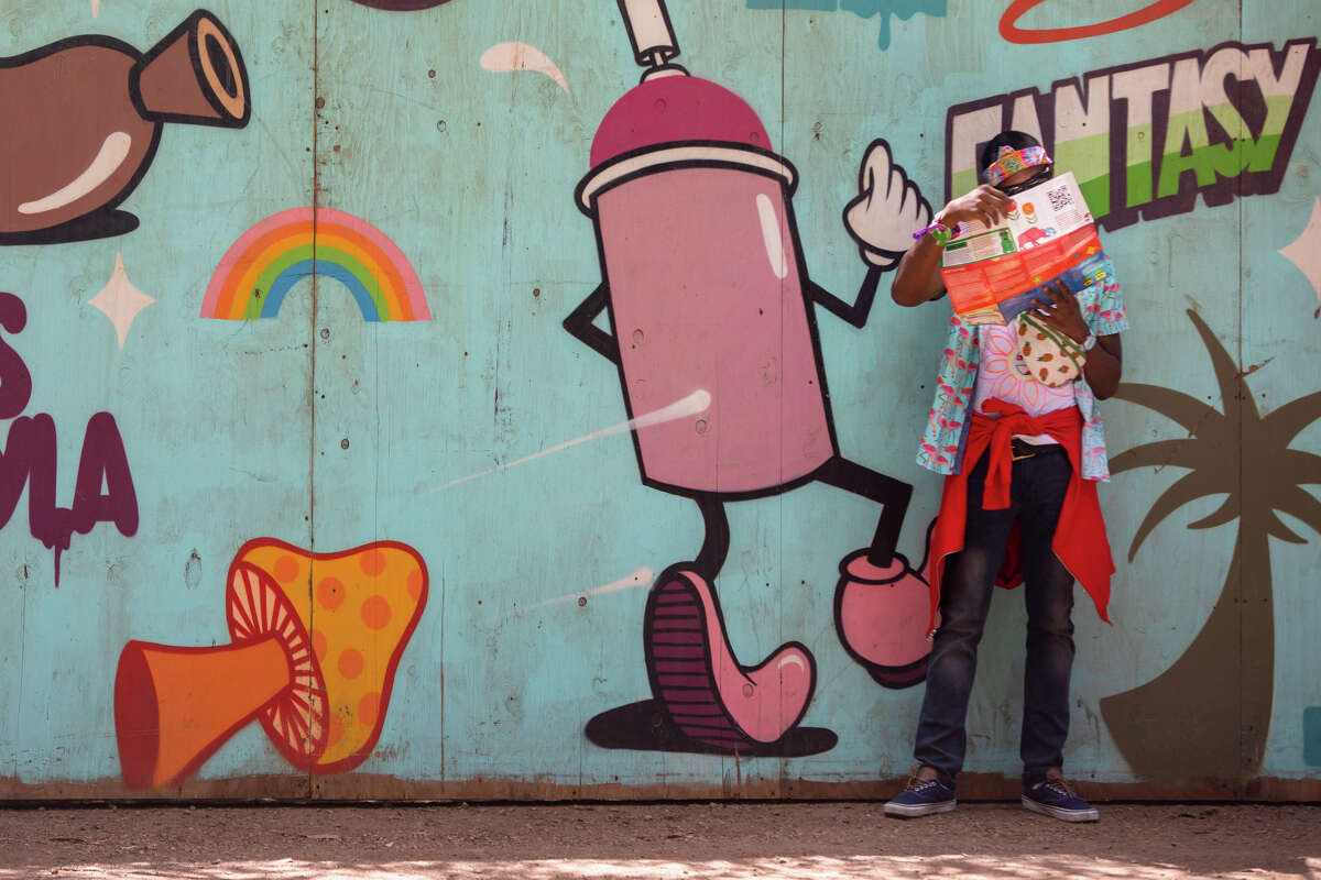 A festival-goer looks at a map at Outside Lands in Golden Gate Park in San Francisco, California on August 5, 2022.