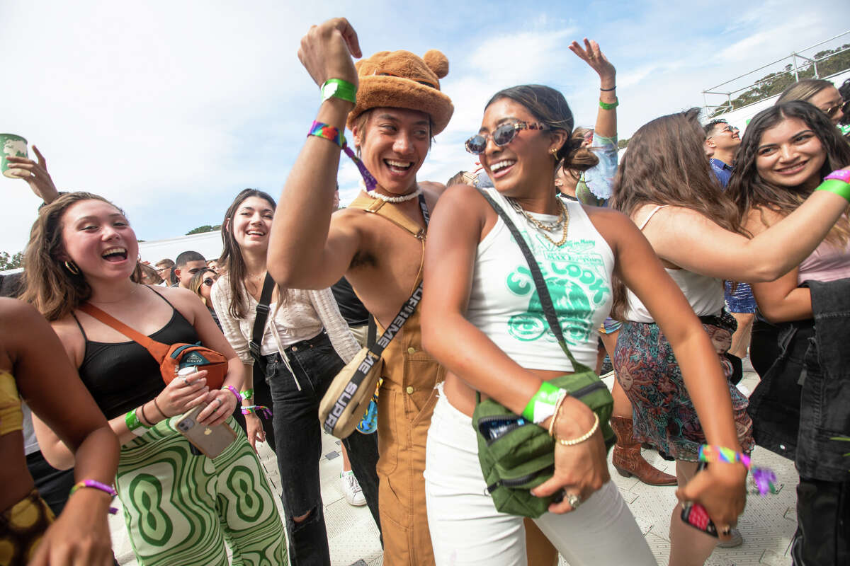 Festival-goers dance to DJ Umami at Outside Lands in Golden Gate Park in San Francisco, California on August 5, 2022.