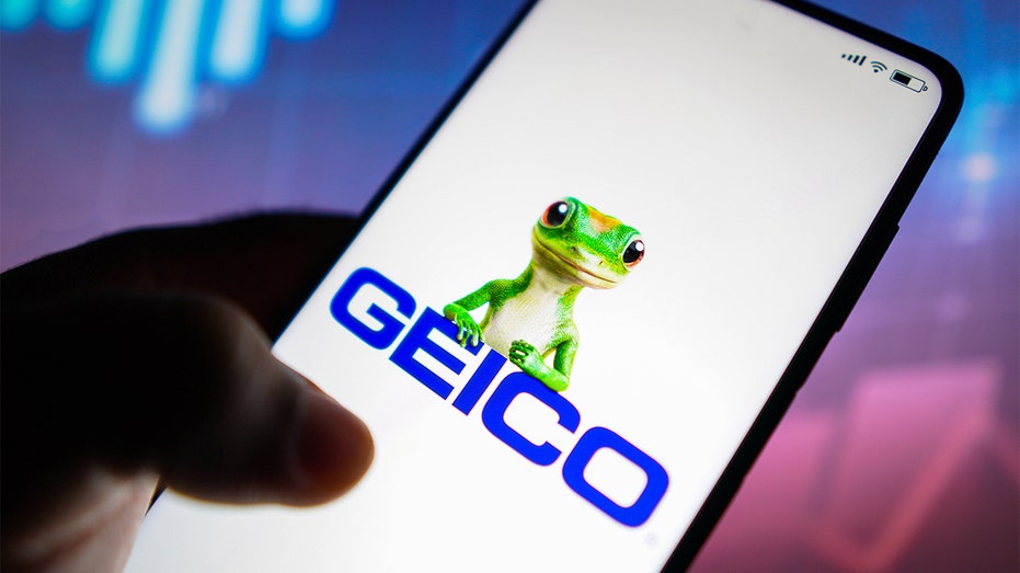 GEICO logo seen on a smartphone