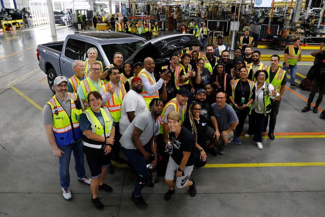Fallon, centered, joined the Ford workers on Friday.