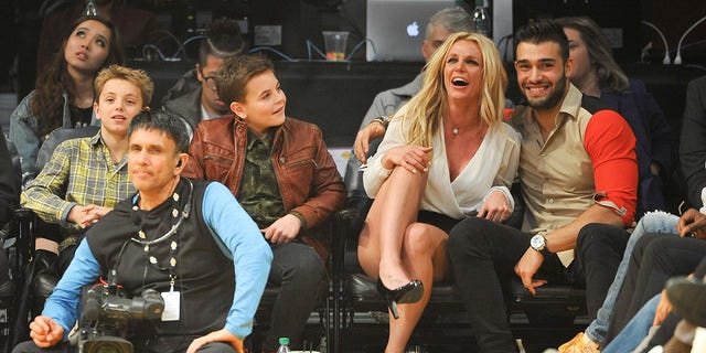 Sean Federline, Jayden James Federline, Britney Spears and Sam Asghari attend a basketball game between Los Angeles Lakers and Golden State Warriors at Staples Center on November 29, 2017 in Los Angeles, California. 