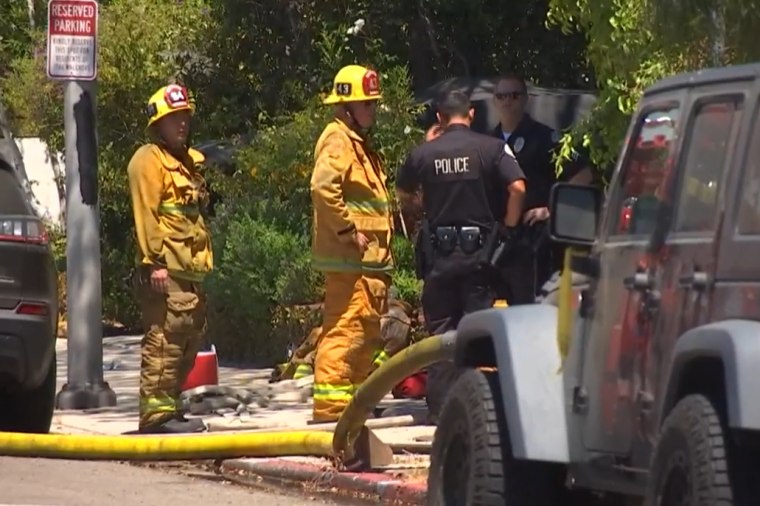 Police and firefighters are investigating the scene of a car accident involving Anne Heche in Mar Vista, California on Friday.