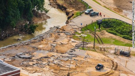 A Kentucky Army National Guard helicopter crew investigates flood damage in eastern Kentucky on Saturday.